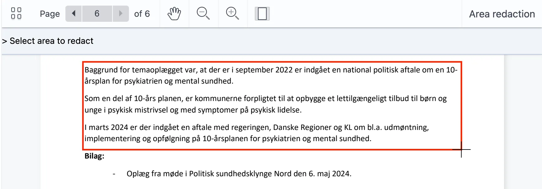 En boks trukket over et område i dokumentet med værktøjet Area redaction.
